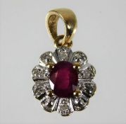 A 9ct gold diamond & ruby pendant 1g