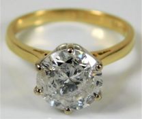 An 18ct gold solitaire ring set with certified G c