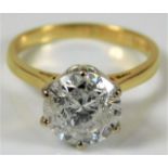 An 18ct gold solitaire ring set with certified G c