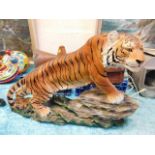 A large resin model of a tiger