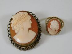 A 9ct gold cameo ring twinned with a yellow metal