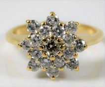 An 18ct diamond cluster ring of approx. 0.8ct size