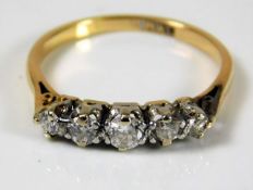 An 18ct gold five stone old cut diamond ring appro