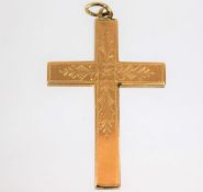 A yellow metal cross 3.9g