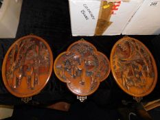 Three carved Chinese plaques