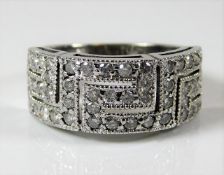 An 18ct white gold diamond dress ring of approx. 1