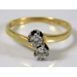 A 9ct gold diamond crossover ring size R/S 3.7g