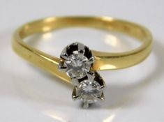 A 9ct gold diamond crossover ring size R/S 3.7g