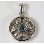 A 14ct white gold pendant set with white & blue ce