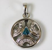 A 14ct white gold pendant set with white & blue ce
