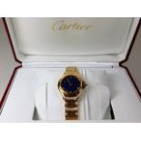 A fine ladies Cartier 18ct gold quartz blue dial w