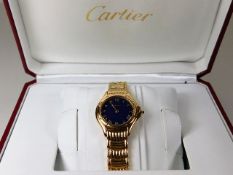 A fine ladies Cartier 18ct gold quartz blue dial w