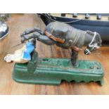 A cast iron mechanical kicking mule bank