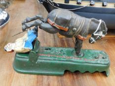 A cast iron mechanical kicking mule bank