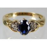 A 9ct gold diamond & sapphire ring size P 2.8g