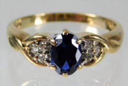 A 9ct gold diamond & sapphire ring size P 2.8g