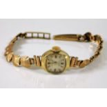 A 9ct gold watch including strap 11.3g