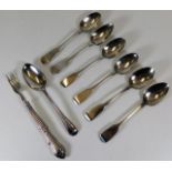 Seven silver spoons twinned with a silver handled