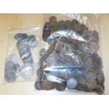 A bagged quantity of copper coinage twinned with a