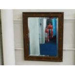 A vintage framed mirror 47cm x 38cm