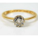 An 18ct gold solitaire set with 0.75ct diamond siz