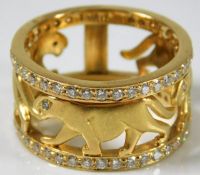 A 18ct gold ring depicting panthers set with appro