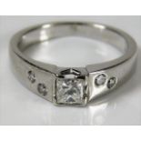 An 18ct white gold ring set with 0.5ct princess cu