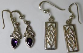 A pair of sterling silver earrings