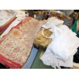A quantity of linen items including child's gowns
