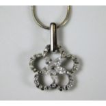 An 18ct white gold necklace & diamond pendant set