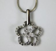 An 18ct white gold necklace & diamond pendant set