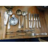 Five silver handled butter knives twinned with pla