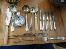 Five silver handled butter knives twinned with pla
