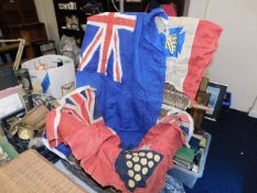 A wicker basket with boat/yacht flags