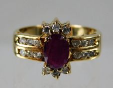 A 9ct gold diamond & ruby ring size M 4.3g