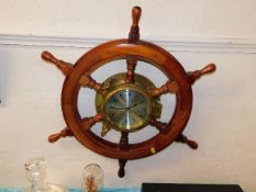 A brass ships style wheel clock