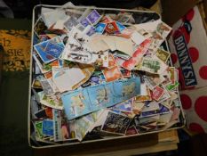 A tin of loose stamps