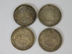 Four white metal coins 89g