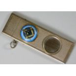 A silver cigar cutter set with masonic porcelain e