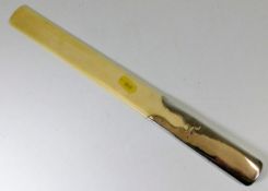 A silver handled ivory page turner 15in long