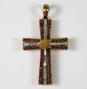 A 9ct gold cross set with white & cinnamon coloure