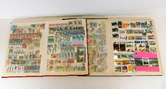 Two Commonwealth stamp albums