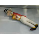 A Sunny Jim stuffed figure with Force Wheat Flakes