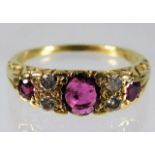 A c.1900 18ct gold ring set with ruby & diamond si