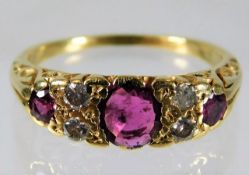 A c.1900 18ct gold ring set with ruby & diamond si