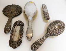 A selection of silver backed dressing table items