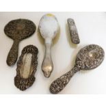 A selection of silver backed dressing table items