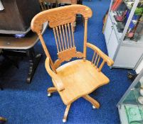 An oak Captains chair