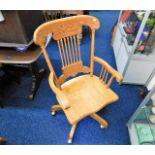 An oak Captains chair