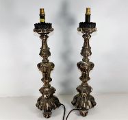 A pair of 19thC. continental giltwood candlesticks
